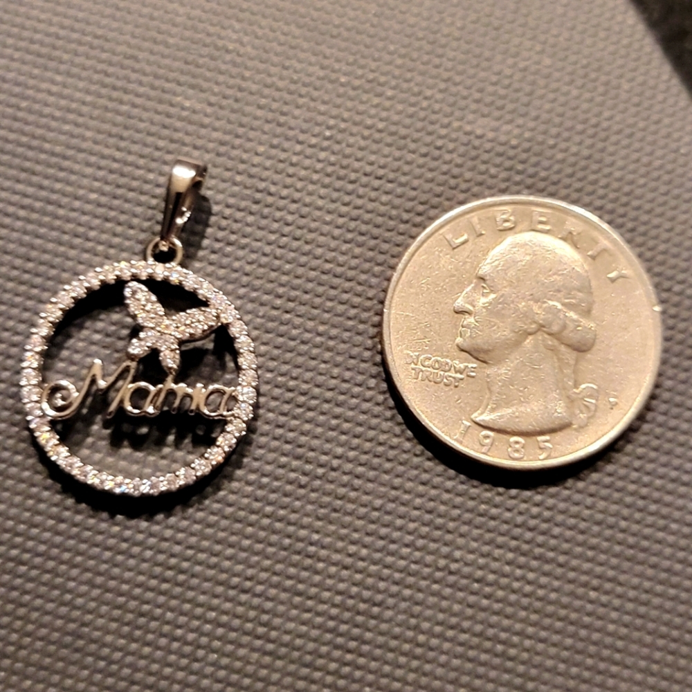 14k white gold fill over brass Mama/butterfly pendant.